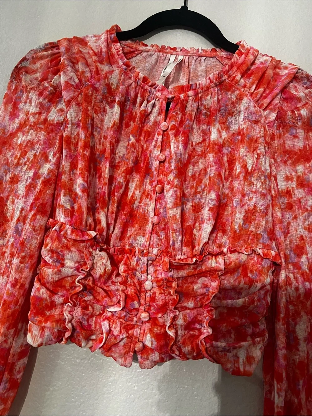Anthropologie women’s Red-Orange Printed Ruffled Button-Front Top. Preowned